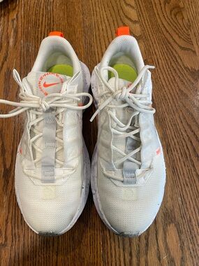 Nike Women off white Sneakers with Neon Orange Swoosh